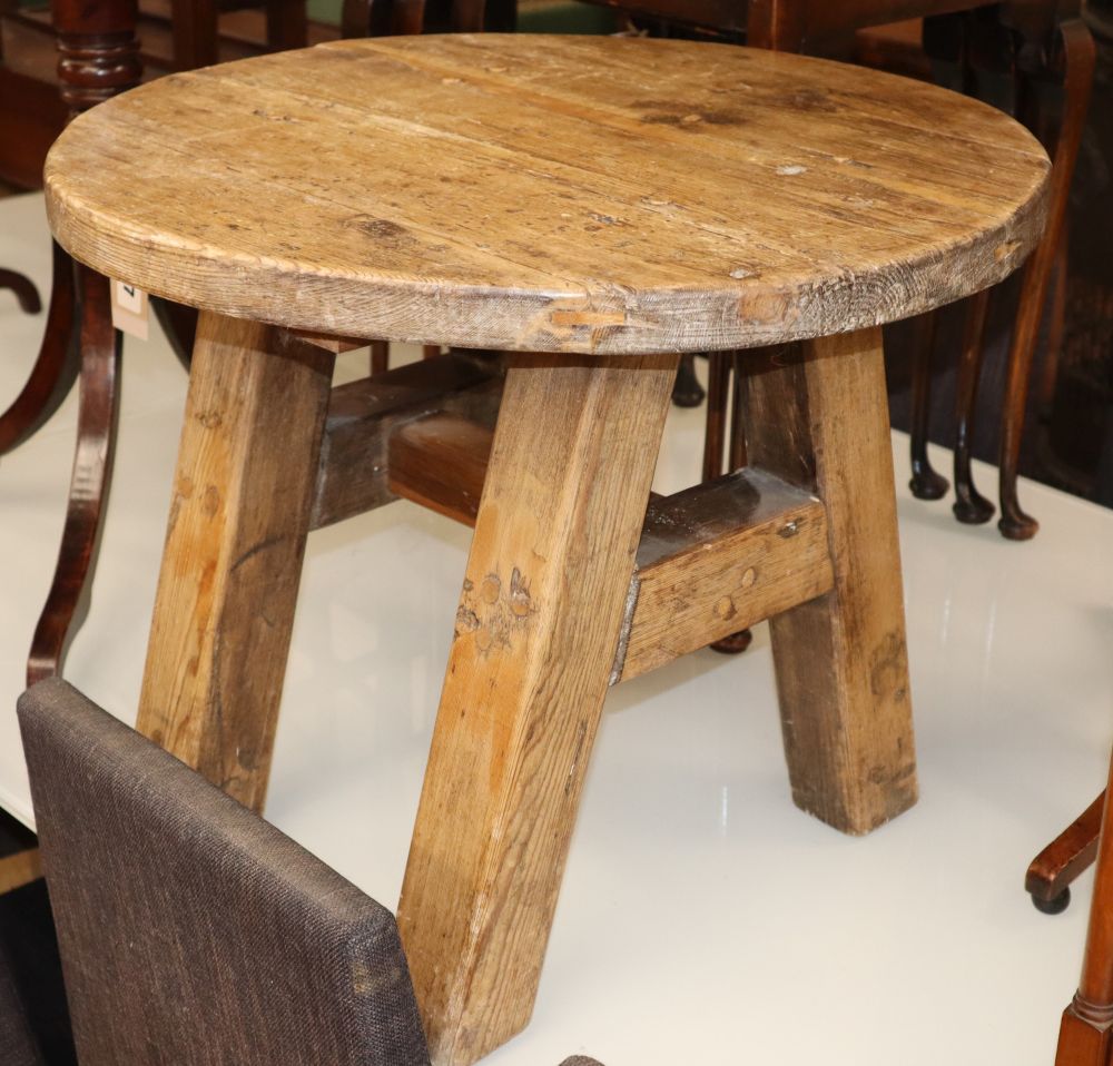 A 19th century pine circular low table, Diam.52cm